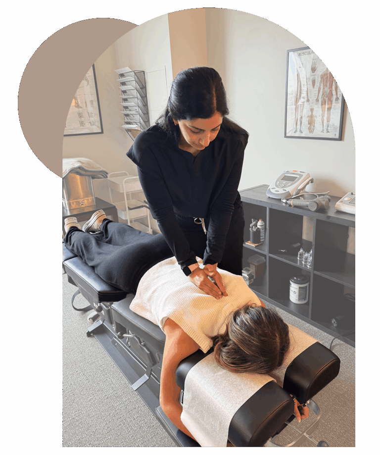 Patient receiving chiropractic adjustment from chiropractor in Overland Park