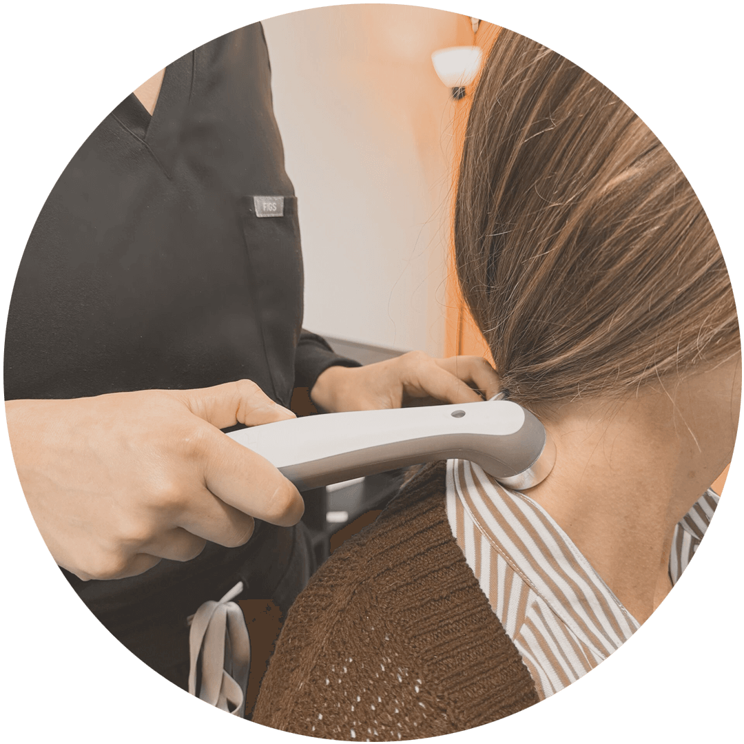 Therapeutic ultrasound treatment for pain relief at Karim Chiropractic